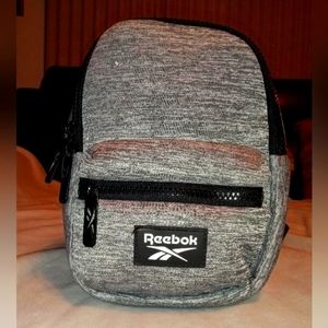 Small gray and black Reebok backpack unisex